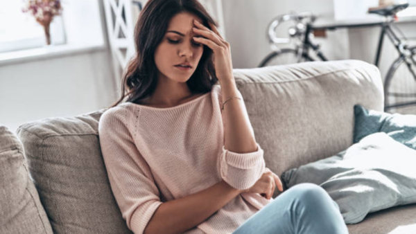 Woman experiencing overwhelming fatigue