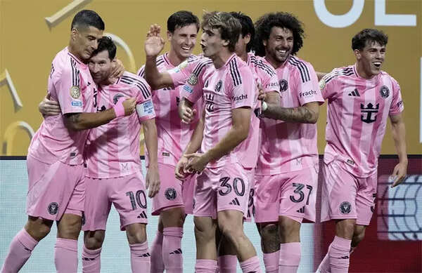 Messi and Suarez celebrate Miami goal.